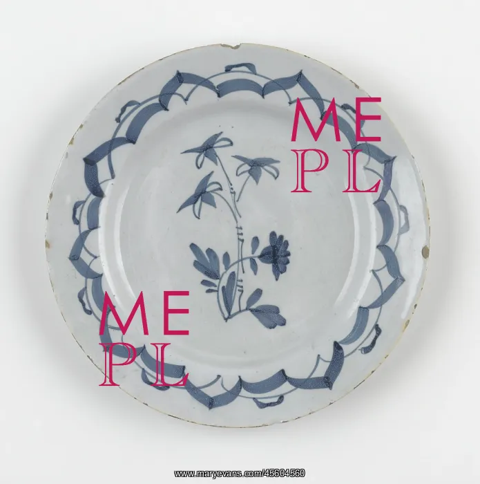 : Plate. Tin-glazed earthenware plate painted in blue with a central floral stem : Plate. Tin-glazed earthenware plate painted in blue with a central floral stem