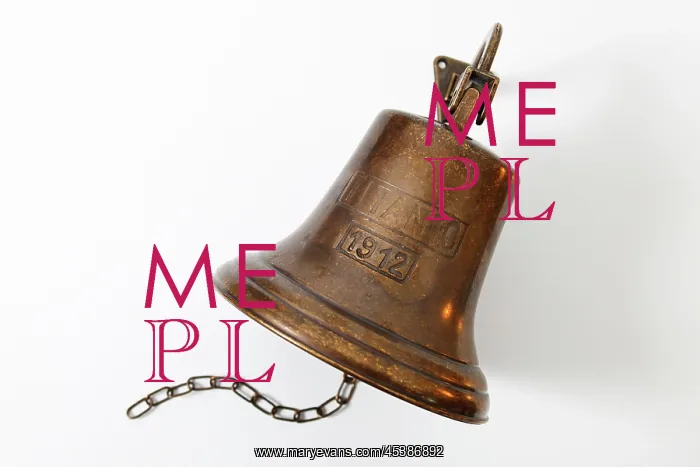 : Titanic. Copper ship's bell lettered titanic 1912 on white background : Titanic. Copper ship's bell lettered titanic 1912 on white background