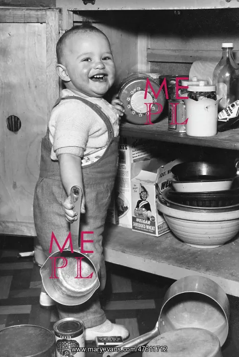 : Toddler helping out in the kitchen : Toddler helping out in the kitchen