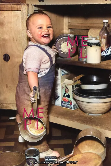 : Toddler helping out in the kitchen : Toddler helping out in the kitchen