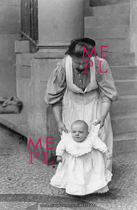 : Toddler learns to walk with nanny, 1909 : Toddler learns to walk with nanny, 1909