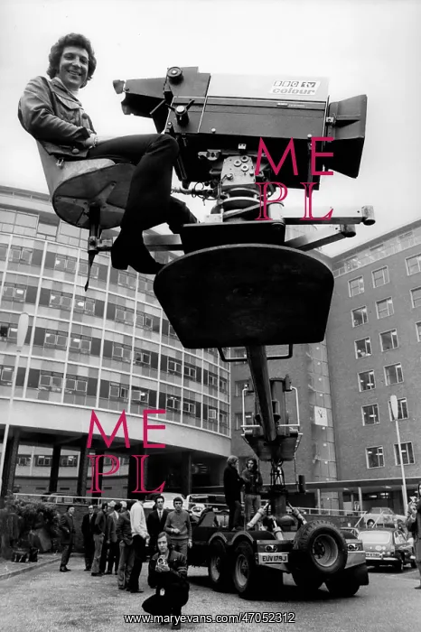 : Tom Jones sitting on a camera crane at BBC : Tom Jones sitting on a camera crane at BBC
