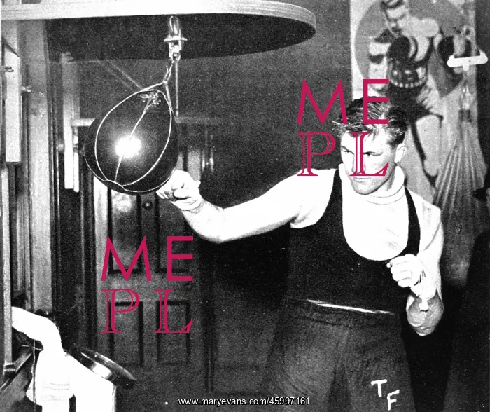 : Tommy Farr using a punch ball, 1937 : Tommy Farr using a punch ball, 1937