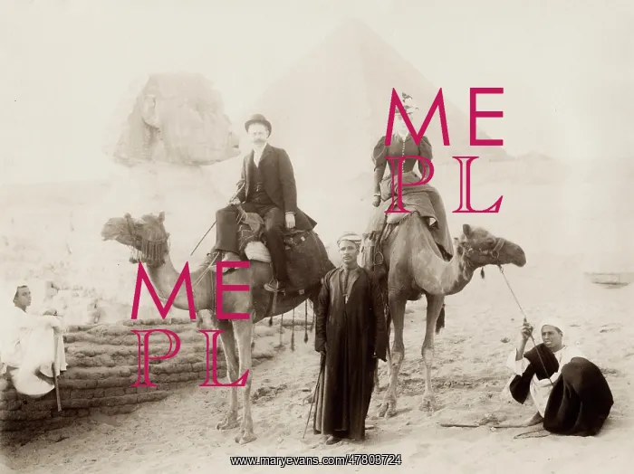 : Tourists on camels with guides visiting the Sphinx : Tourists on camels with guides visiting the Sphinx