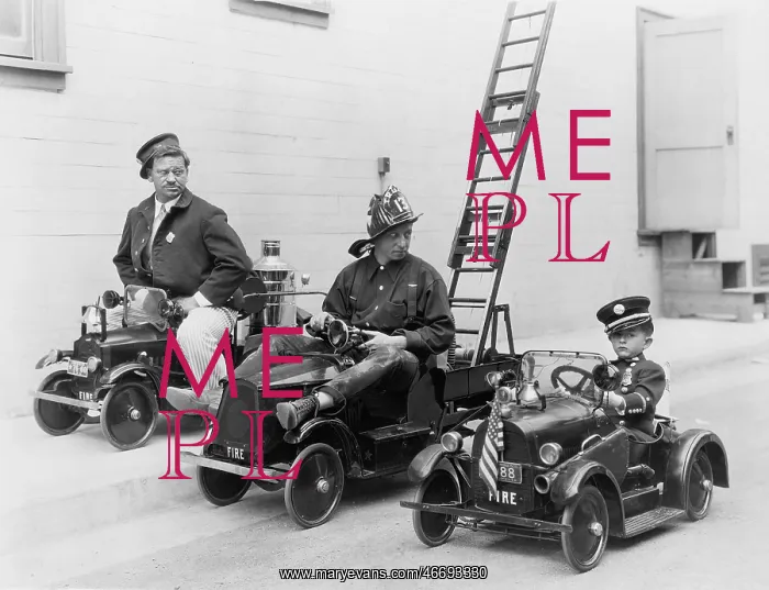 : Three toy fire engines with child and adults driving : Three toy fire engines with child and adults driving