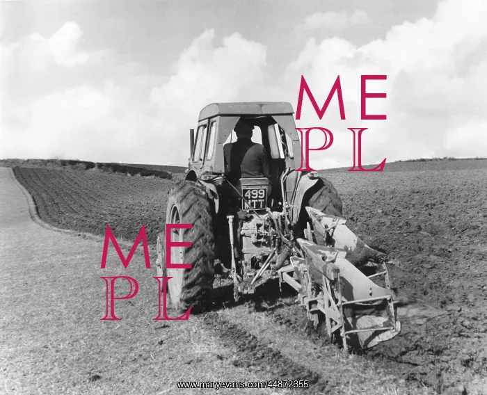 : TRACTOR PULLING A PLOUGH : TRACTOR PULLING A PLOUGH