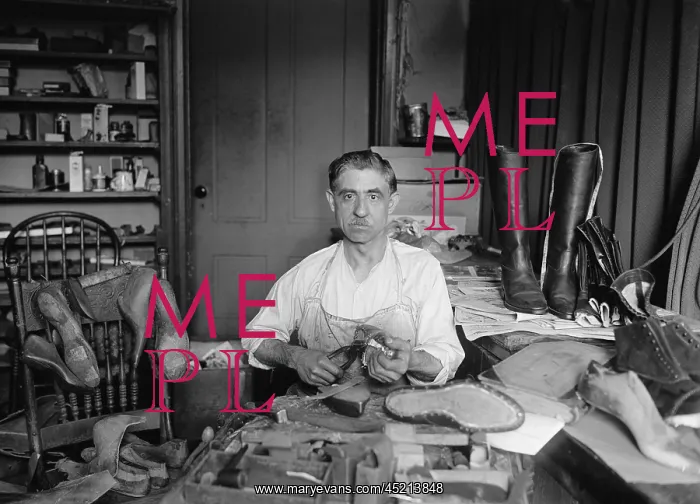 : Traditional shoemaker in his workshop is ? : Traditional shoemaker in his workshop is ?