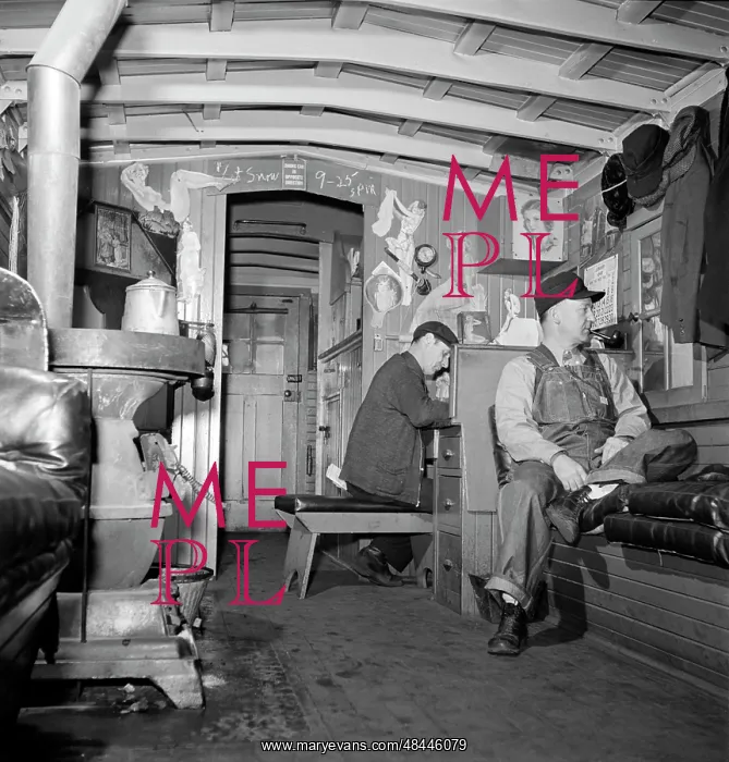 : Train conductors relaxing in the caboose, 1943 : Train conductors relaxing in the caboose, 1943