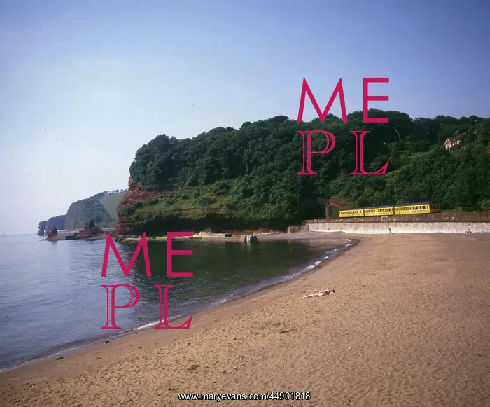 : Train passing through Coryton Cove, Dawlish, Devon : Train passing through Coryton Cove, Dawlish, Devon