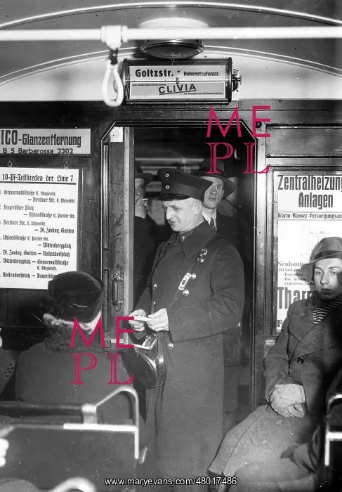 : Tram conductor in a Berlin tram, 1934 : Tram conductor in a Berlin tram, 1934