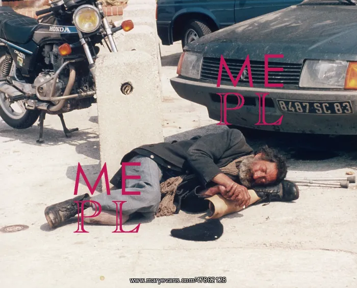 : Tramp asleep with prosthetic leg : Tramp asleep with prosthetic leg