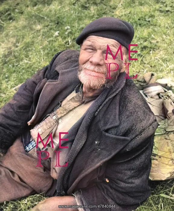 : Tramp sitting on grass, Balham, SW London : Tramp sitting on grass, Balham, SW London