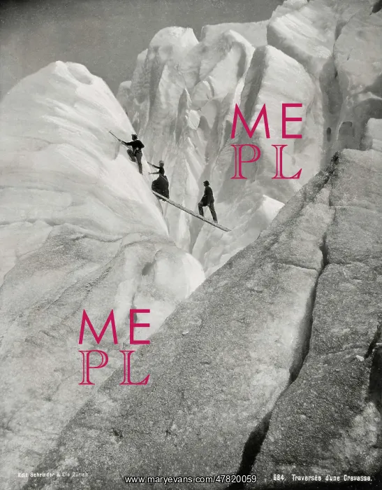 : Traversing a crevasse, climbers in the Alps : Traversing a crevasse, climbers in the Alps
