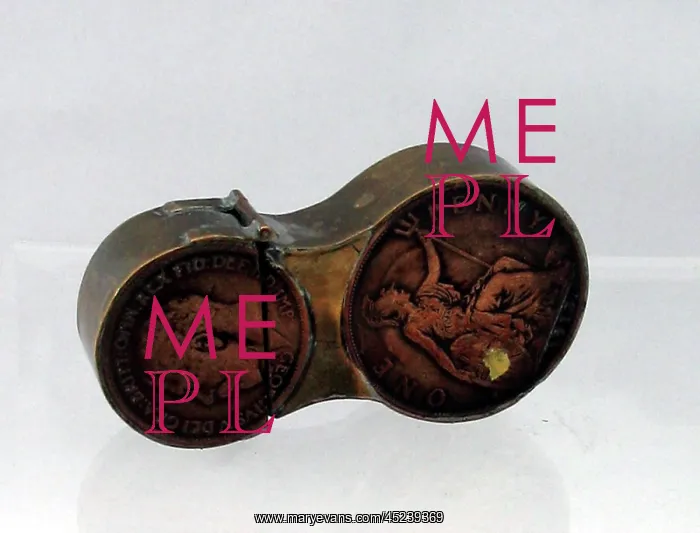 : Trench Art lighter in the shape of the number eight : Trench Art lighter in the shape of the number eight