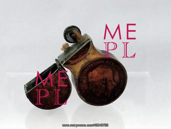 : Trench Art lighter in the shape of the number eight : Trench Art lighter in the shape of the number eight