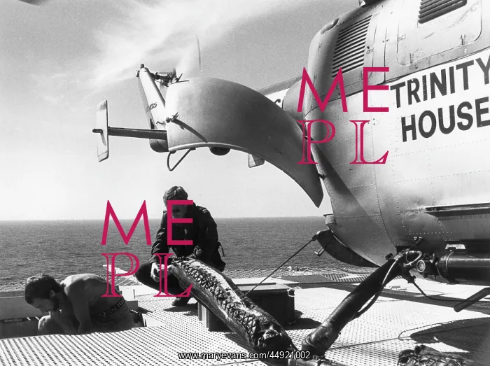 : Trinity House Service Helicopter on Bishop Rock lighthouse : Trinity House Service Helicopter on Bishop Rock lighthouse