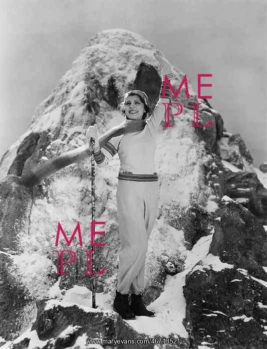  : Triumphant woman at mountain summit