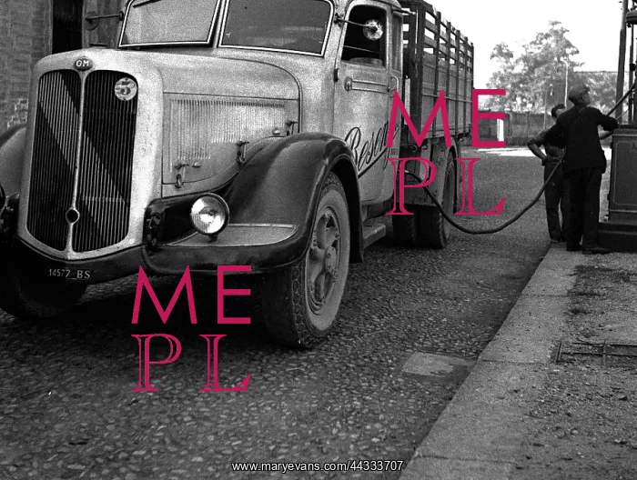 : Truck at a tanking station : Truck at a tanking station