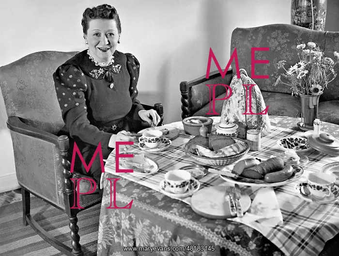 : Trude Hesterberg during the breakfast, 1937 : Trude Hesterberg during the breakfast, 1937