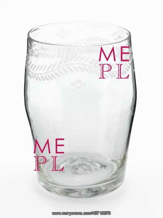 : Tumbler. Barrel-shaped glass tumbler engraved with a border of meandering foliage : Tumbler. Barrel-shaped glass tumbler engraved with a border of meandering foliage