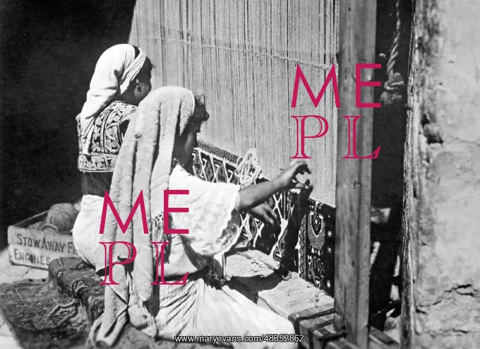 : Tunisian women weaving carpets : Tunisian women weaving carpets