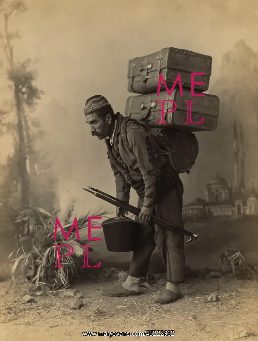 : Turkish porter carrying luggage on his back. ? : Turkish porter carrying luggage on his back. ?