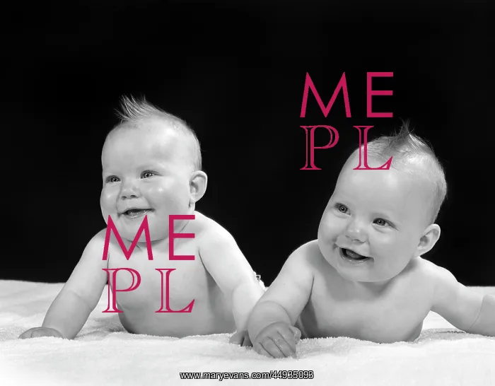 : Two Twin Babies Smiling Lying on their Stomachs looking up : Two Twin Babies Smiling Lying on their Stomachs looking up