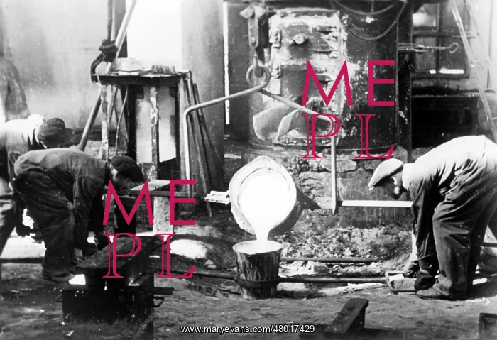 : Ukrainian workers mold wheel bushes, 1942 : Ukrainian workers mold wheel bushes, 1942