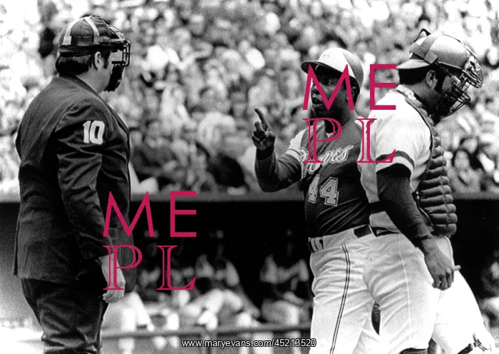 : Umpire John McSherry listens to Hank Aaron ? : Umpire John McSherry listens to Hank Aaron ?