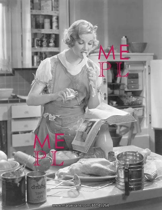 : Una Merkel at a stove : Una Merkel at a stove