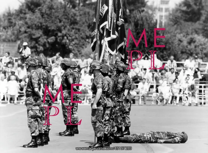: Unconscious U.S. soldier during the festivities for the Inde : Unconscious U.S. soldier during the festivities for the Inde