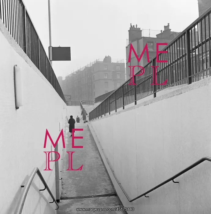 : Underpass. Looking down into an underpass with two women climbing the slope opposite : Underpass. Looking down into an underpass with two women climbing the slope opposite