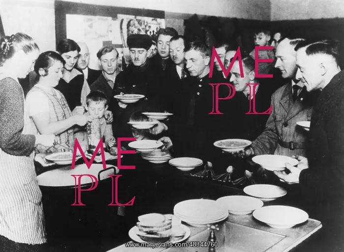  : Unemployed in a public soup kitchen, 1930