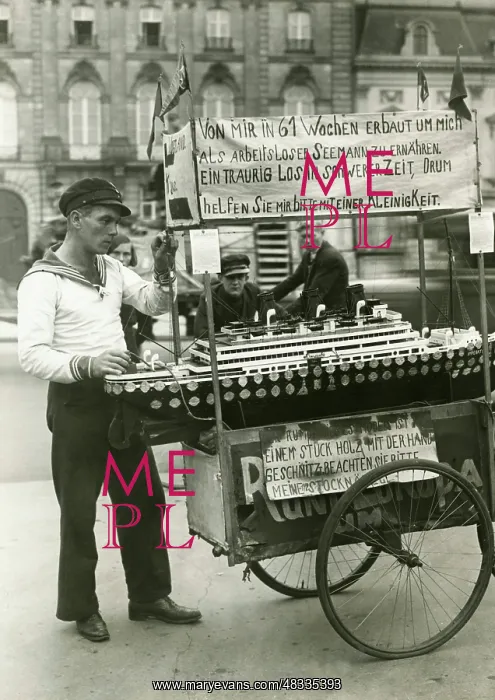 : Unemployed sailor with his model ship in front : Unemployed sailor with his model ship in front