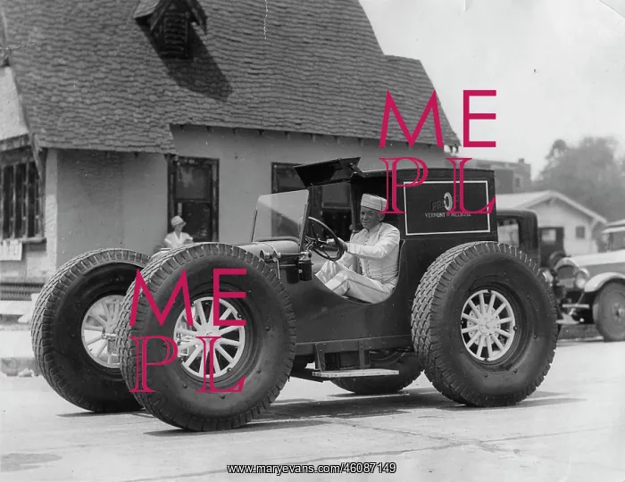: An unique vehicle with large tires : An unique vehicle with large tires