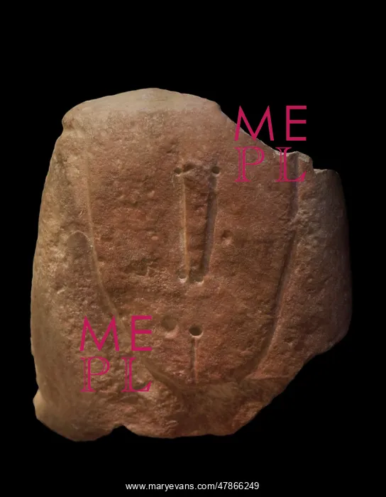 : Upper part of a statue menhir made of globigerina : Upper part of a statue menhir made of globigerina