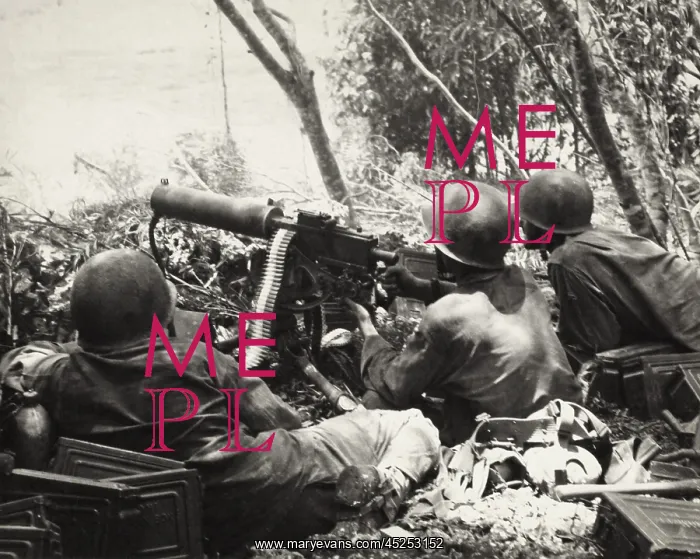 : U.S. Army machine gun crew fires on Japanese positions : U.S. Army machine gun crew fires on Japanese positions