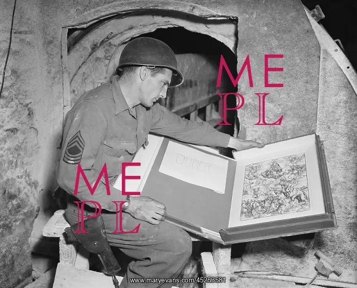 : U.S. Army sergeant Harold Maus inspects a Durer : U.S. Army sergeant Harold Maus inspects a Durer