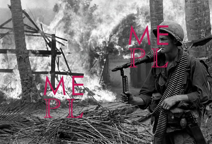 : A U.S. Army soldier stands with his M60 machine : A U.S. Army soldier stands with his M60 machine