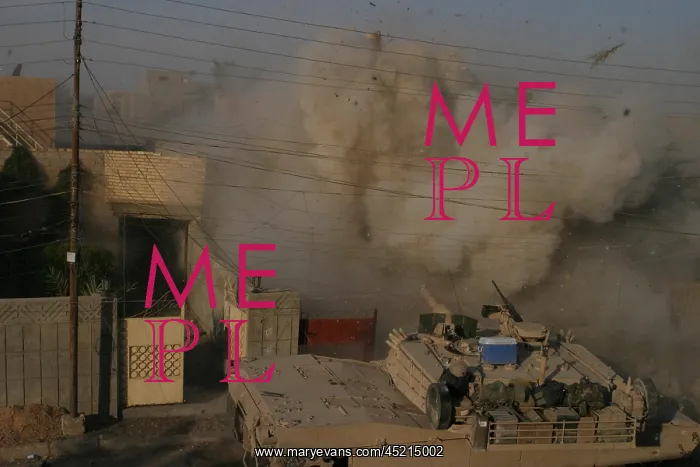 : A U.S. Marine Corps Abrams tank blasts into ? : A U.S. Marine Corps Abrams tank blasts into ?