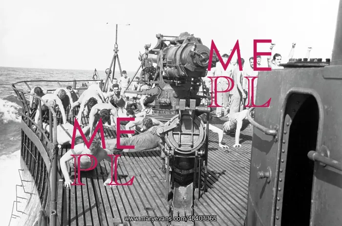 : U.S. Marine Raiders exercise on the deck of : U.S. Marine Raiders exercise on the deck of