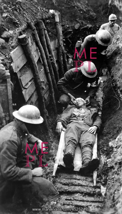 : U.S. Marine receiving first aid in the trenches : U.S. Marine receiving first aid in the trenches
