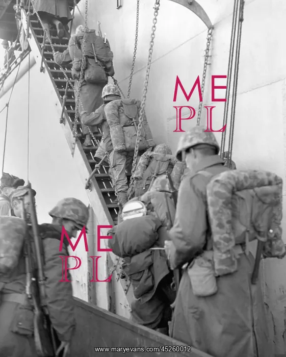: U.S. Marines board a ship for evacuation from : U.S. Marines board a ship for evacuation from