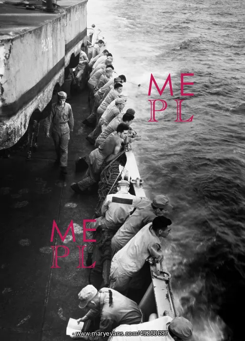 : U.S. Marines stand along the rail of the USS Clymer : U.S. Marines stand along the rail of the USS Clymer