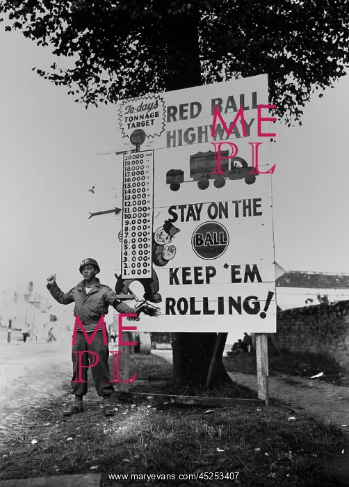: U.S. MP waves on a Red Ball Express motor convoy : U.S. MP waves on a Red Ball Express motor convoy