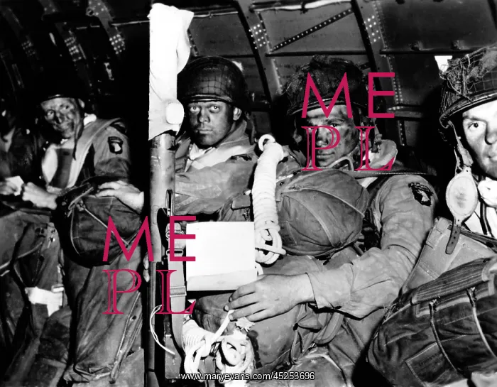  : U.S. paratroopers with blackened faces in a C-47
