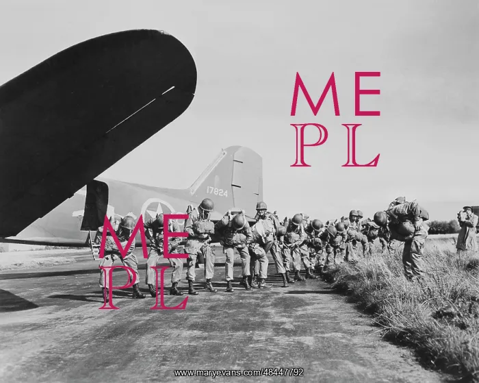 : U.S. paratroopers checking their parachutes : U.S. paratroopers checking their parachutes
