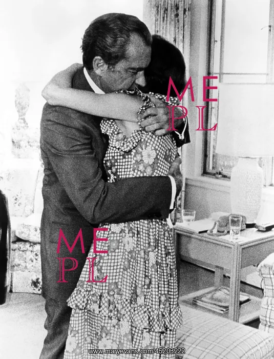: U.S. President Richard Nixon hugging his ? : U.S. President Richard Nixon hugging his ?