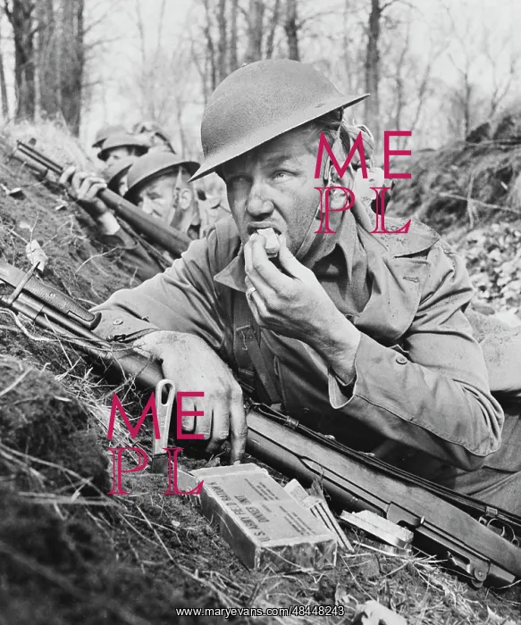 : U.S. soldier eating field ration, circa 1942 : U.S. soldier eating field ration, circa 1942