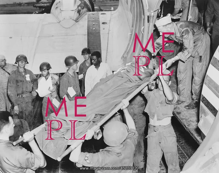 : U.S. soldier is lifted from a Air Force C-47 in : U.S. soldier is lifted from a Air Force C-47 in